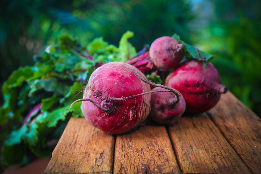 Red beets on a wooden table