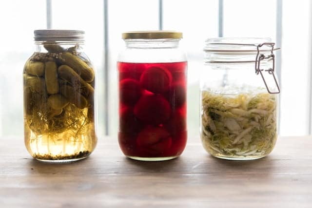 Jars of probiotic foods.