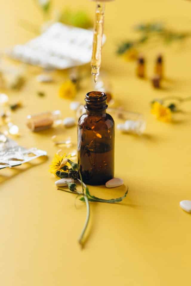 A liquid dietary supplement being poured from a dropper bottle, emphasizing its high bioavailability and ease of absorption—supporting informed nutrition choices with Nutrition Therapy Institute.