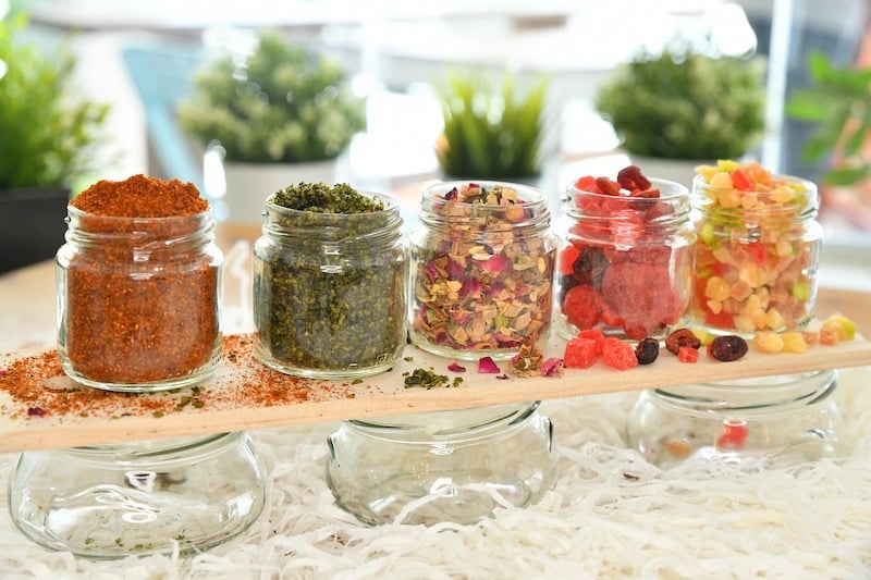 Premade wellness-focused food products in jars created by nutrition professionals.