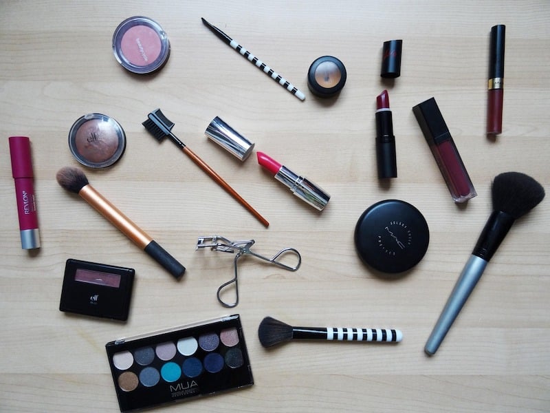 Makeup products including lipstick and foundation